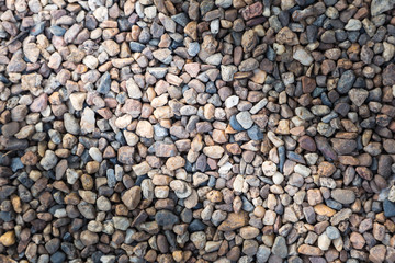 Stone pebbles texture or stone pebbles background. stone pebbles for interior exterior decoration and industrial construction concept design. stone pebbles motifs that occurs natural.