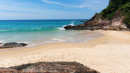 Beautiful scenery landscape of tropical sea and wave crashing on sandy shore in thailand.