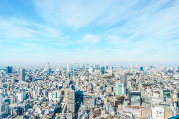 Asia Business concept for real estate and corporate construction - panoramic modern city skyline aerial view of Shinjuku area under blue sky in Tokyo, Japan