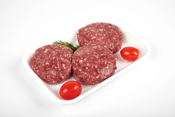 minced meat in plastic package isolated on white background
