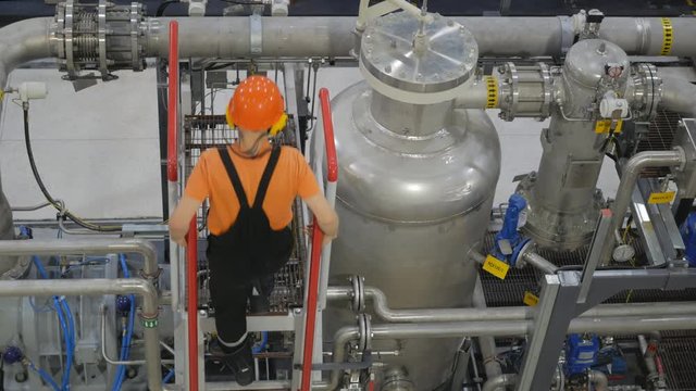 The engineer rises to the equipment for his control