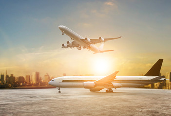 jet plane flying over runways and beautiful dusky sky with copy space use for air transport...