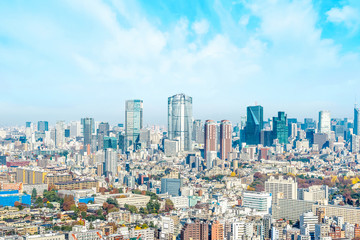 Fototapeta na wymiar Asia Business concept for real estate and corporate construction - panoramic modern city skyline aerial view of Roppongi hill under blue sky in Tokyo, Japan.