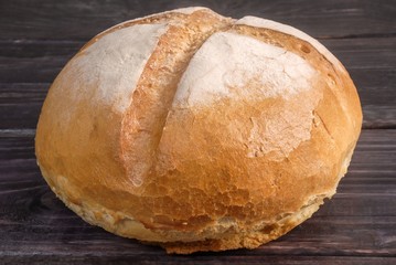 Bread on a wood table / background