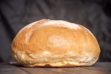 Bread on a wood table / background