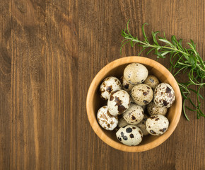 Quail Eggs on Wooden Background
