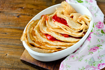 Casserol of pancakes with strawberries