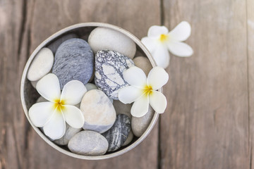 frangipani and stones in a big blow