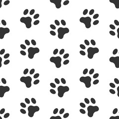 Seamless vector pattern of dog paw track. Pawprints