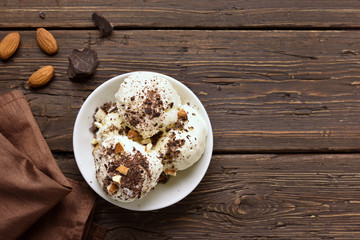 Obraz na płótnie Canvas Tasty chocolate ice cream with nuts