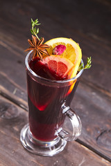 mulled wine on the wooden background
