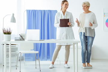 Woman standing on scales