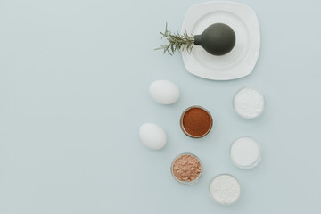 Minimal Flat Lay with Ingredients for cooking chocolate  cakes. Top view, copy space, flat lay .