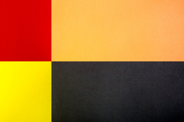 Background of rectangular figures of yellow, red, black and orange