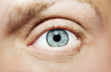 Fototapeta premium Image of man's beautiful insightful look eye close up.