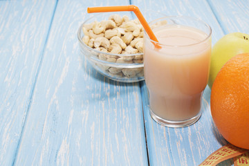 The concept of a healthy diet. Small dumbbells, juice. Apples. healthy lifestyle. sport. Fitness food.