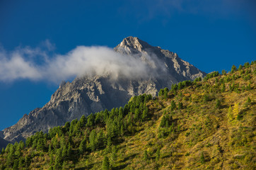 Cloud on top of the mountain