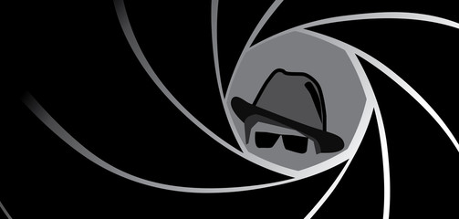 Silhouette of spy, secret agent, detective or gangster in fedora hat and sunglasses seen through a gun barrel. Vector illustration.
