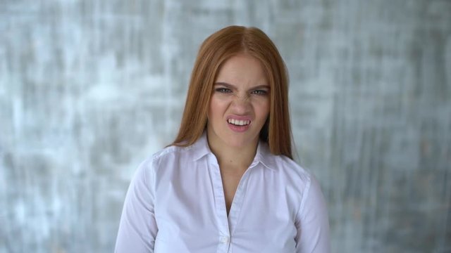 portrait of young woman. body language gestures. she disgusted. skeptical girl rejects, disagreement emotion facial expression people concept, saying no, dislike, rejecting gesture