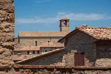 View of the medieval Saint Francis Church in the historic center of Montone, a small town in the Umbria countryside in Italy