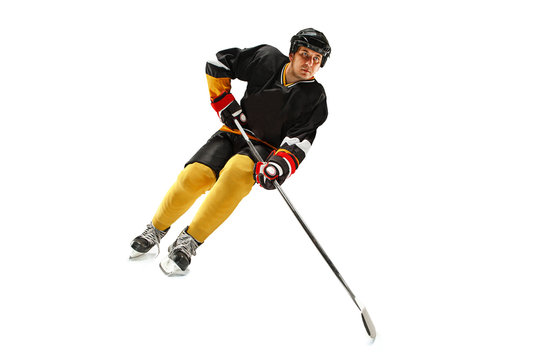 Ice hockey player in action isolated on white.