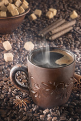 Rustic clay dishes. Delicious morning coffee. Retro Cup of coffee with foam.