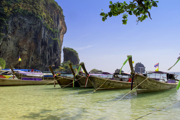 Traditional long-tailed boats in the bay (Thailand)