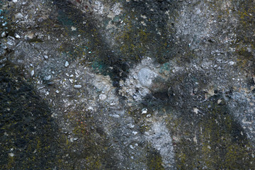 Old grunge cement with pebbles