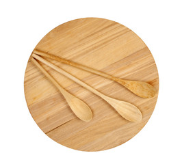 wooden spoon on  cutting board isolated on a white background