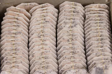 Tea bags arrange in box close-up