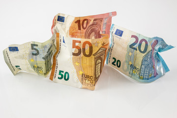 Euro banknotes and white background
