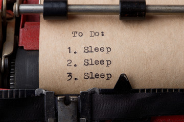 need to sleep concept - to do list on the typewriter close-up