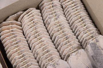 Tea bags arrange in box close-up