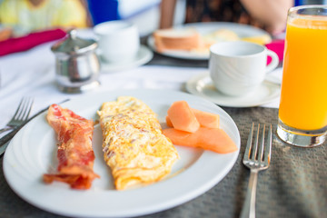 Healthy tasty breakfast on table in outdoor cafe