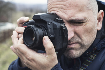 Photographer shooting outdoors scenery