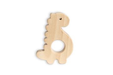 Organic baby teether isolated on white background. Wooden dinosaur toy for babies.