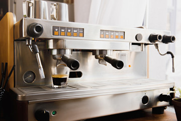 Cooking coffee on modern espresso machine