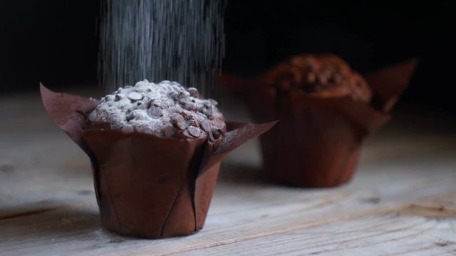 Muffin cake with white powdered sugar. Seamless cinemagraph video