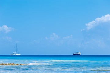 Fototapeta premium Sailing catamarans and waves