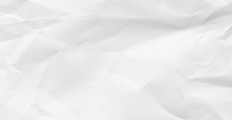 Paper crumple with the texture of the surface of the old. The background is white with kinks and cracks in a retro style.