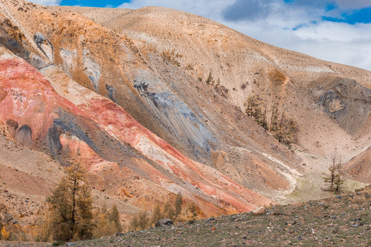 View of the red mountains and hills, the Martian landscape of Kyzyl-Chin. Travel to the national Park in the Altai mountains.