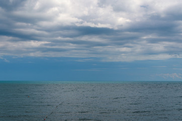 Obraz premium Summer landscape with sea and horizon over water