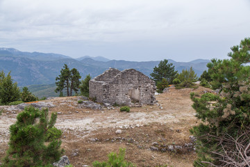 Ruined stone house in the mountains of Bosnia and Herzegovina