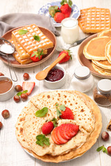 table with crepe, waffle and pancake