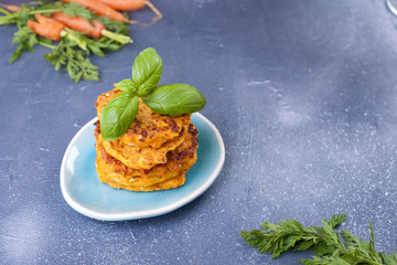Cutlets from carrots for breakfast. Vegetarian healthy food. Spring vegetables and juices. Grapefruit and basil. Free space for text or a postcard