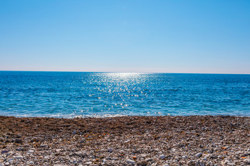 Empty beach on the sunny day. Summer background concept