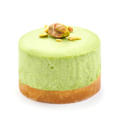 Green chocolate round cheesecake. white isolated background