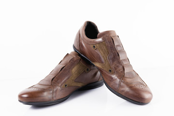 Male brown leather shoe on white background, isolated product, comfortable footwear.