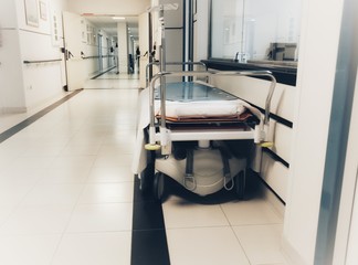 empty bed in the hospital corridor