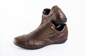 Male brown leather shoe on white background, isolated product, comfortable footwear.